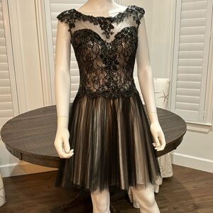 Alyce size 2 black and gold semi formal party dress.